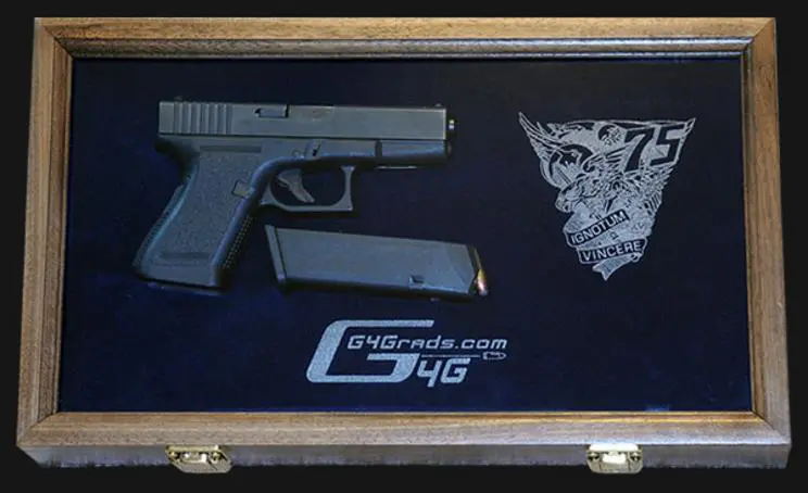 A gun is in a case with some papers on it.